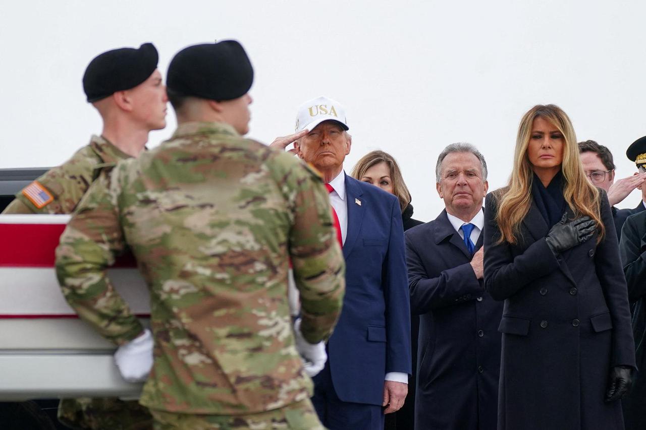 Dignified transfer of the remains of six U.S. Army 103rd Sustainment Command service members killed in Kuwait, in Dover, Delaware