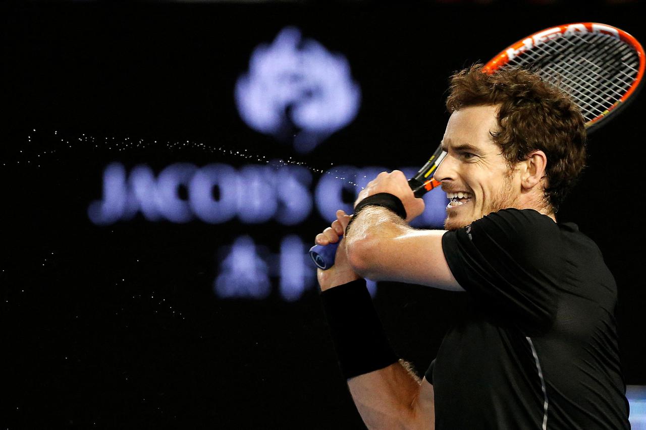 FILE PHOTO: Britain's Andy Murray hits a shot during his final match against Serbia's Novak Djokovic at the Australian Open tennis tournament at Melbourne Park