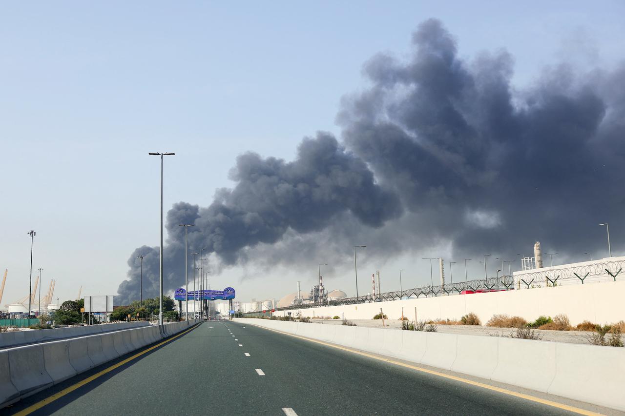 Smoke billows from Jebel Ali port after an Iranian attack, following United States and Israel strikes on Iran, in Dubai
