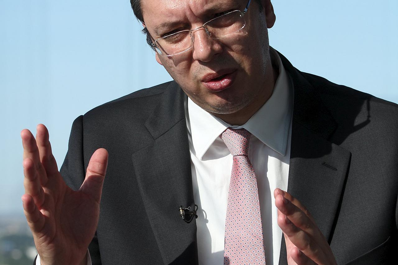Serbian Prime Minister Aleksandar Vucic speaks during an interview with Reuters in Vienna, Austria, August 26, 2015. Vucic said on Wednesday there was a 50/50 chance his government would call an early election, though he declined to give his reasons. REUT
