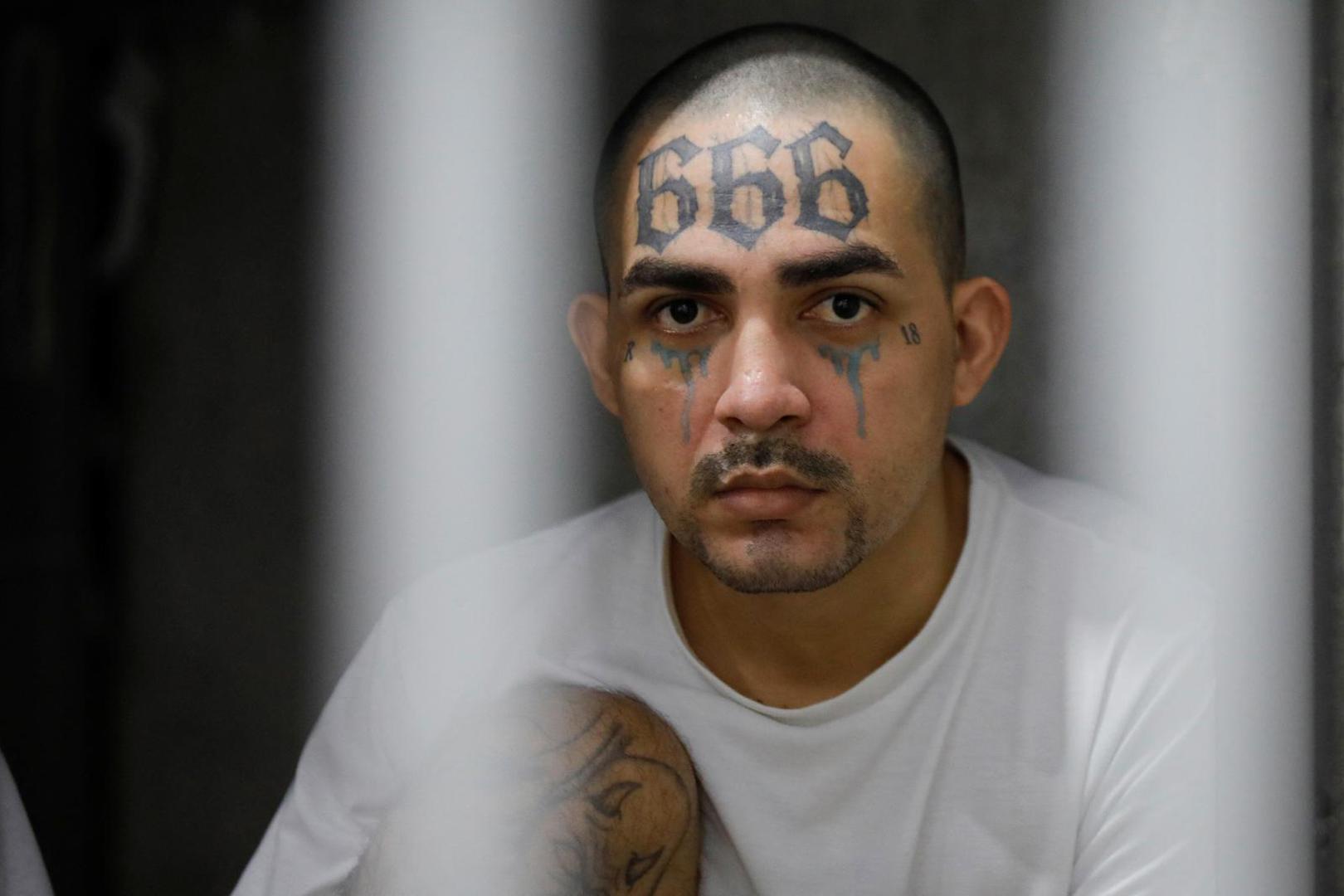 An inmate remains in his cell, during a tour in the "Terrorism Confinement Center" (CECOT) complex, which according to El Salvador's President, Nayib Bukele, is designed to hold 40,000 inmates, in Tecoluca, El Salvador October 12, 2023. REUTERS/Jose Cabezas Photo: Jose CABEZAS/REUTERS