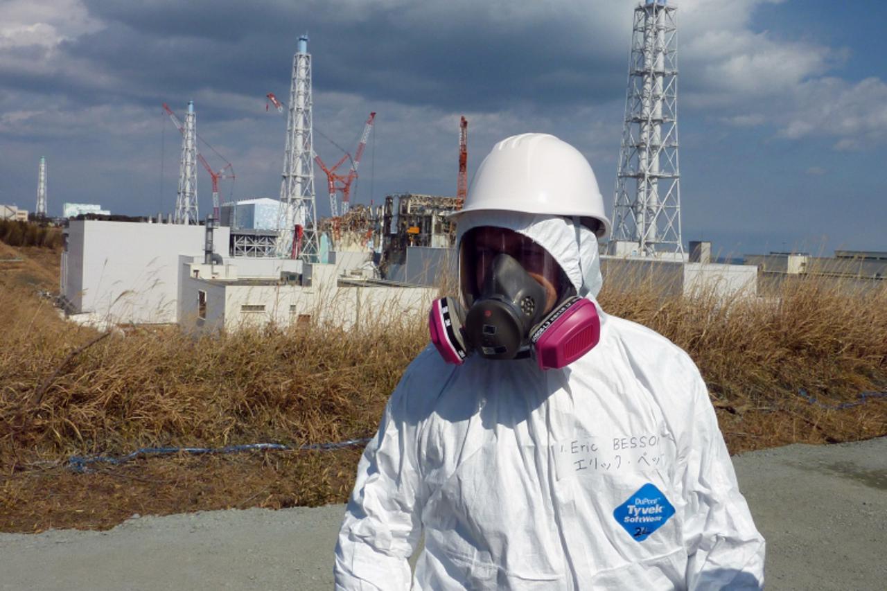 'French Industry and Energy Minister Eric Besson visits the stricken Tokyo Electric Power Co. (TEPCO) Fukushima Daiichi nuclear power plant in Okuma in Fukushima prefecture, northern Japan on February