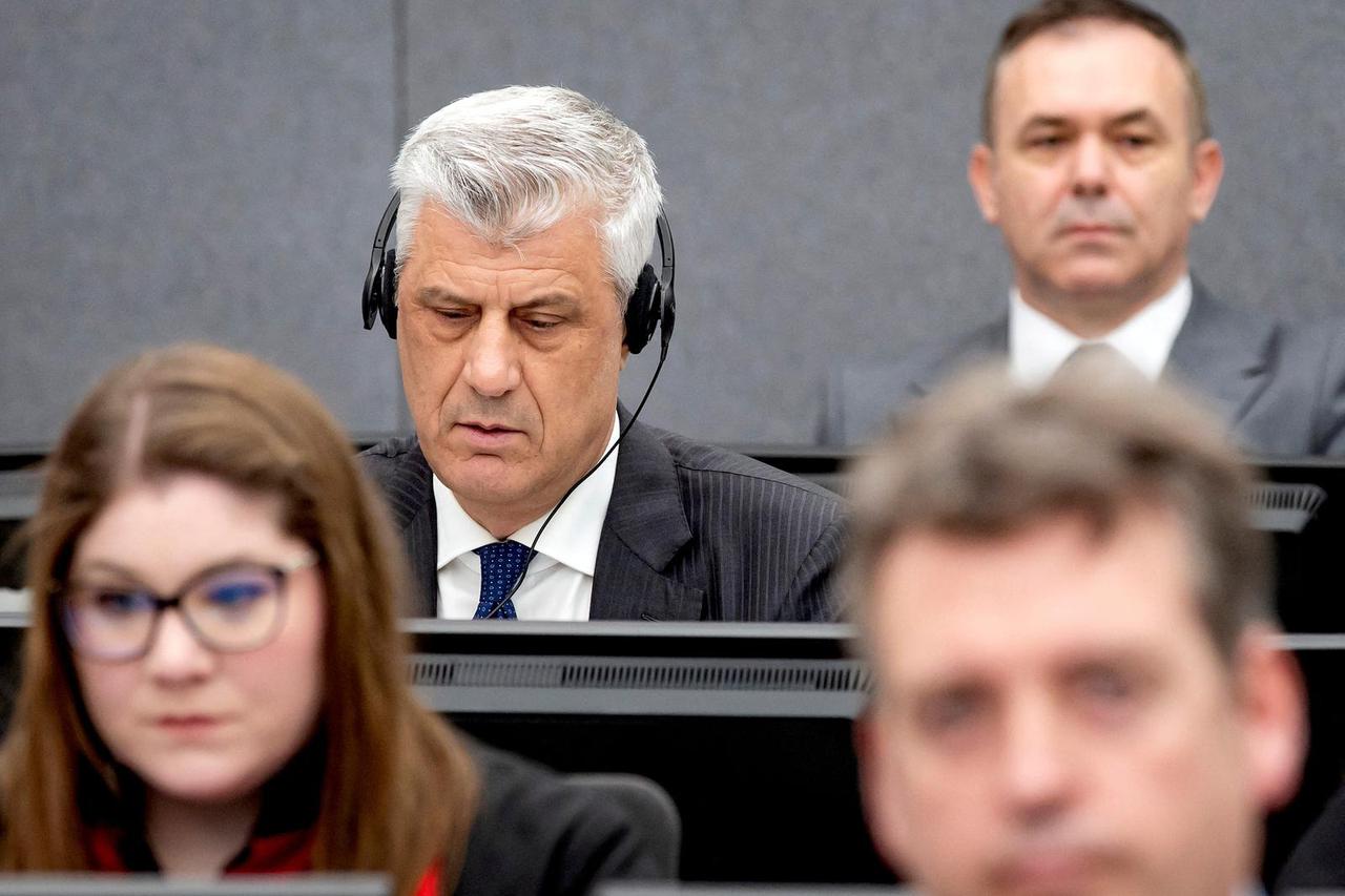 FILE PHOTO: Former Kosovo President Hashim Thaci attends his war crimes trial in The Hague
