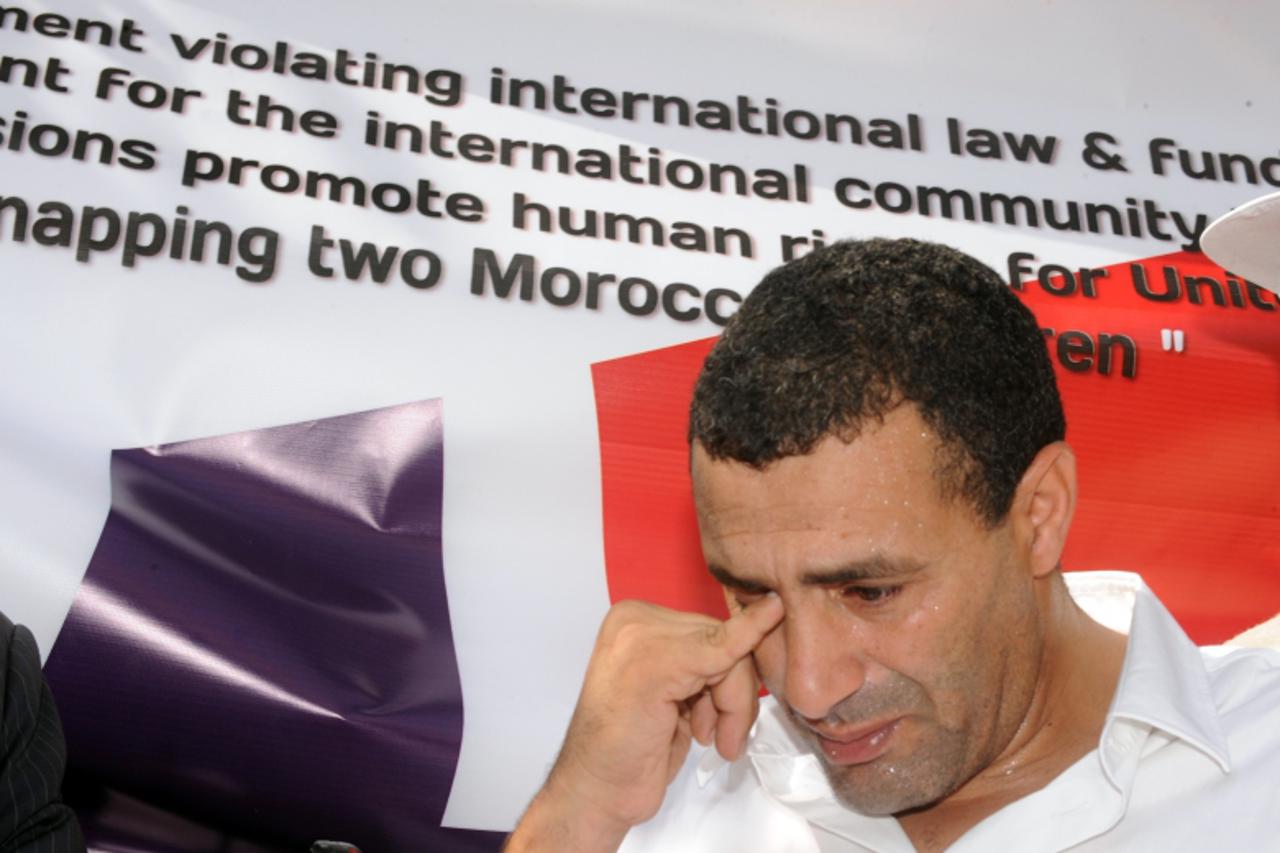 '(FILES) -- A file photo taken on August 19, 2009 shows Moroccan ex-athlete Khalid Skah gesturing during a demonstration in front of the Norwegian embassy in Rabat. Norway\'s government admitted on Fe