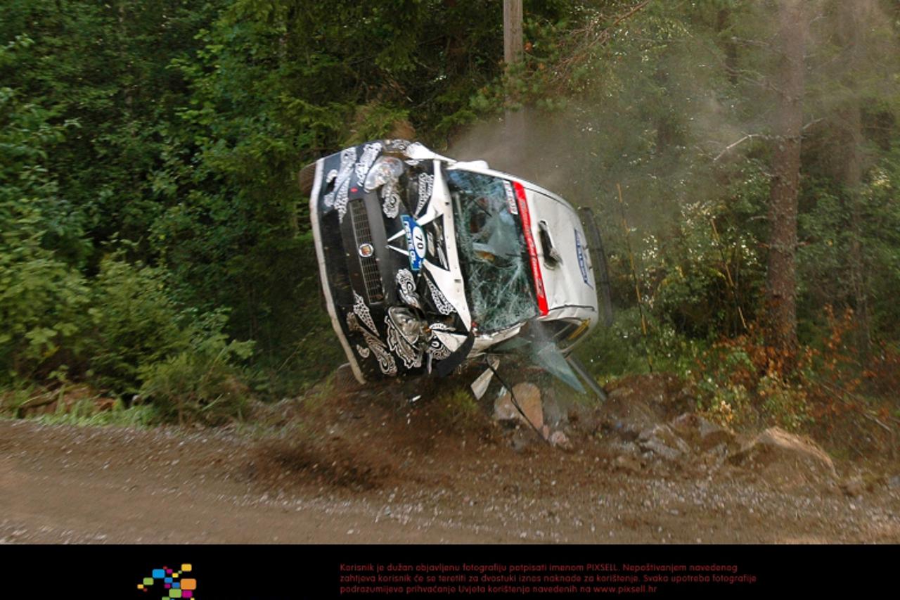 'Kimi Raikkonen (FIN), FIAT Punto Abarth crashes on SS19. World Rally Championship, Rd9, Neste Oil Rally Finland, Jyvaskyla, Finland, Day Two, Saturday 1 August 2009.'