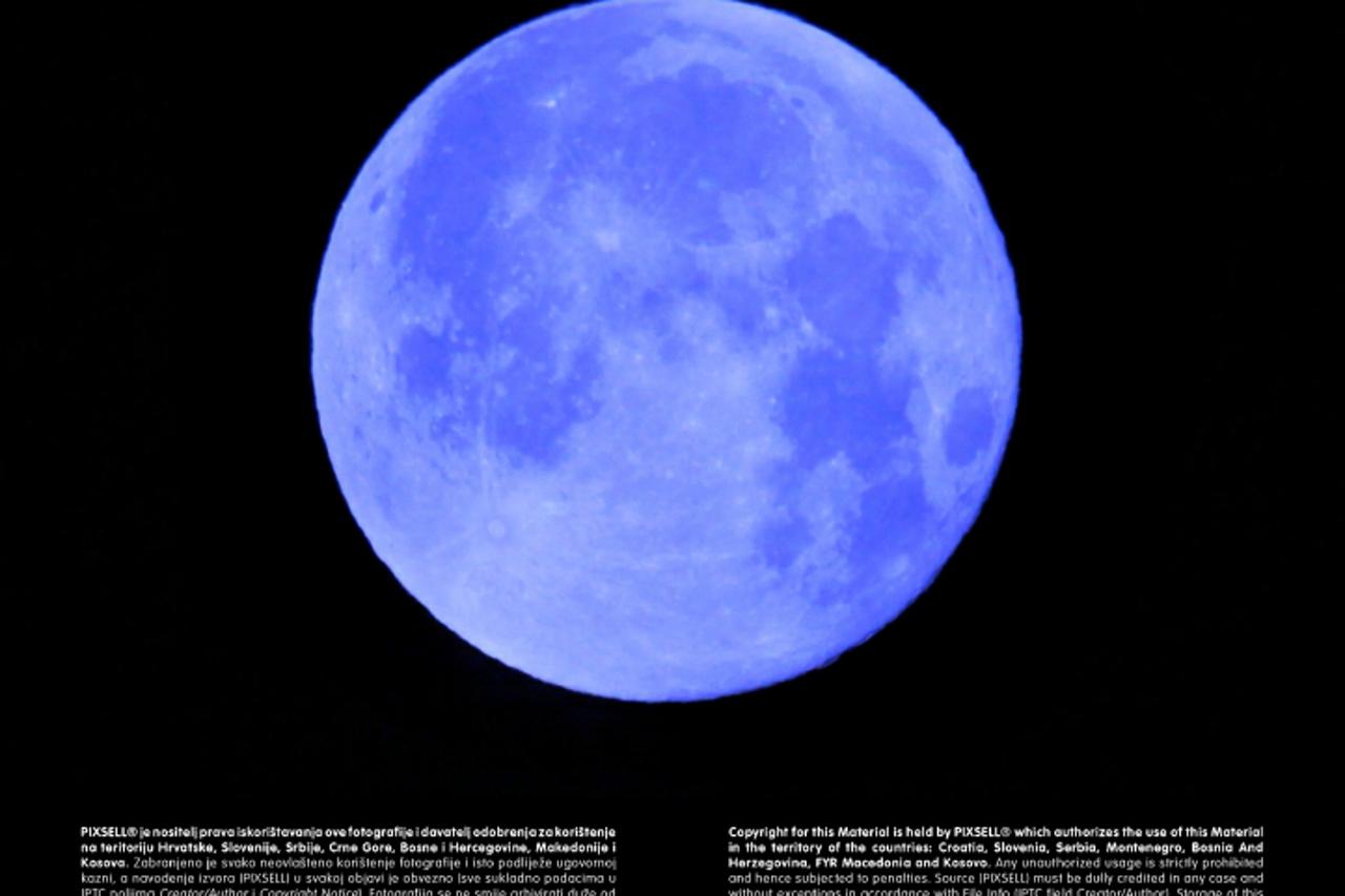 'WORLD RIGHTS  An incredibly rare sight occurred on the first day of 2010-a blue moon appeared. This happens only once every 19 years and is where the saying 'once in a blue moon' originates, St Joh
