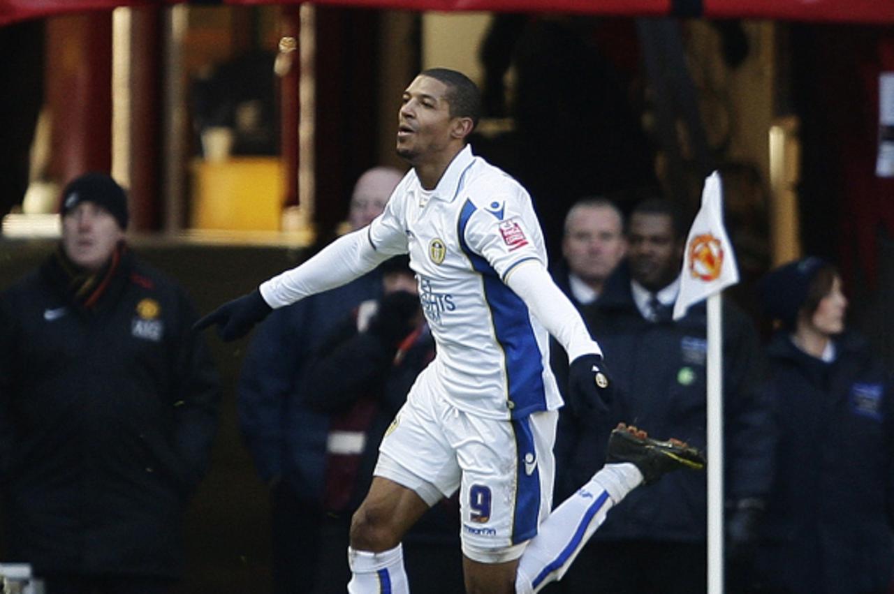 'Leeds United\'s Jermaine Beckford celebrates his goal against Manchester United during their FA Cup soccer match at Old Trafford in Manchester, northern England January 3, 2010.   REUTERS/Darren Stap