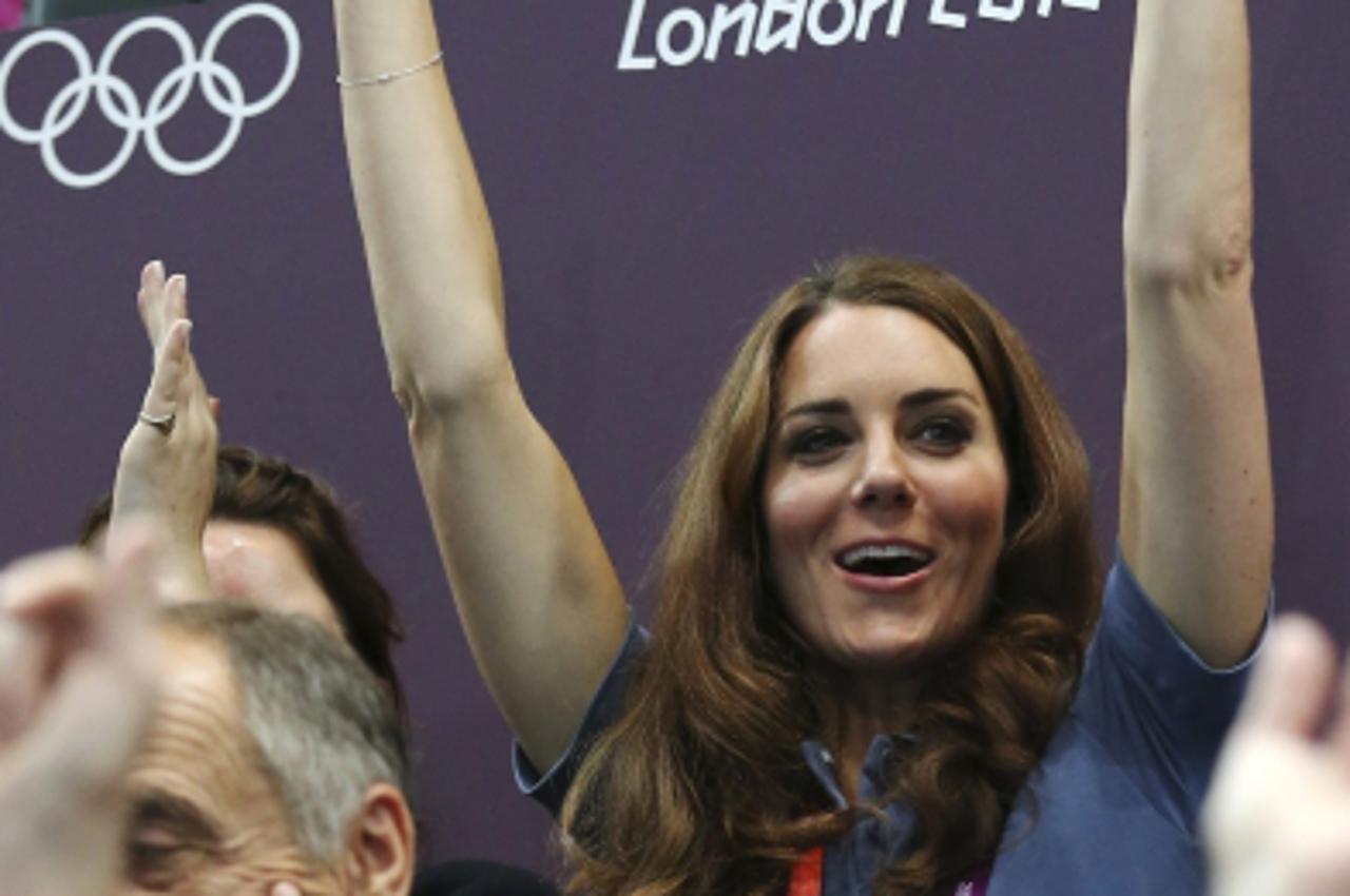'Catherine, Duchess of Cambridge gestures as she watches the women\'s handball preliminaries Group A match between Britain and Croatia at the Copper Box during the London 2012 Olympic Games August 5, 