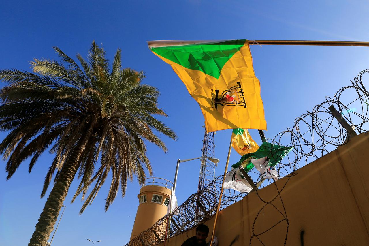 FILE PHOTO: Kataib Hezbollah militia group's flag