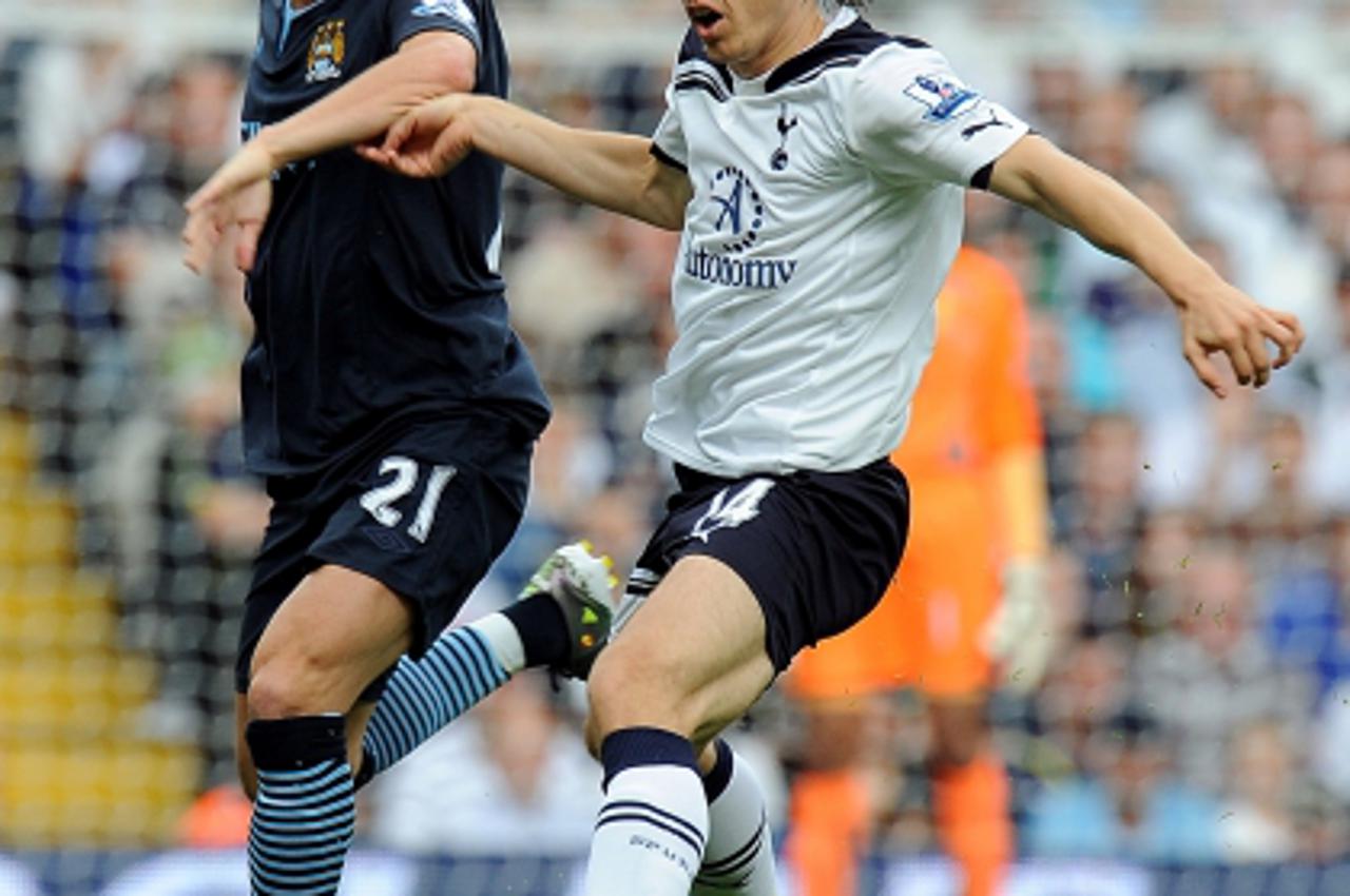 \'Manchester City\'s David Silva (left) and Tottenham Hotspur\'s Luka Modric (right)  Photo: Press Association/Pixsell\'