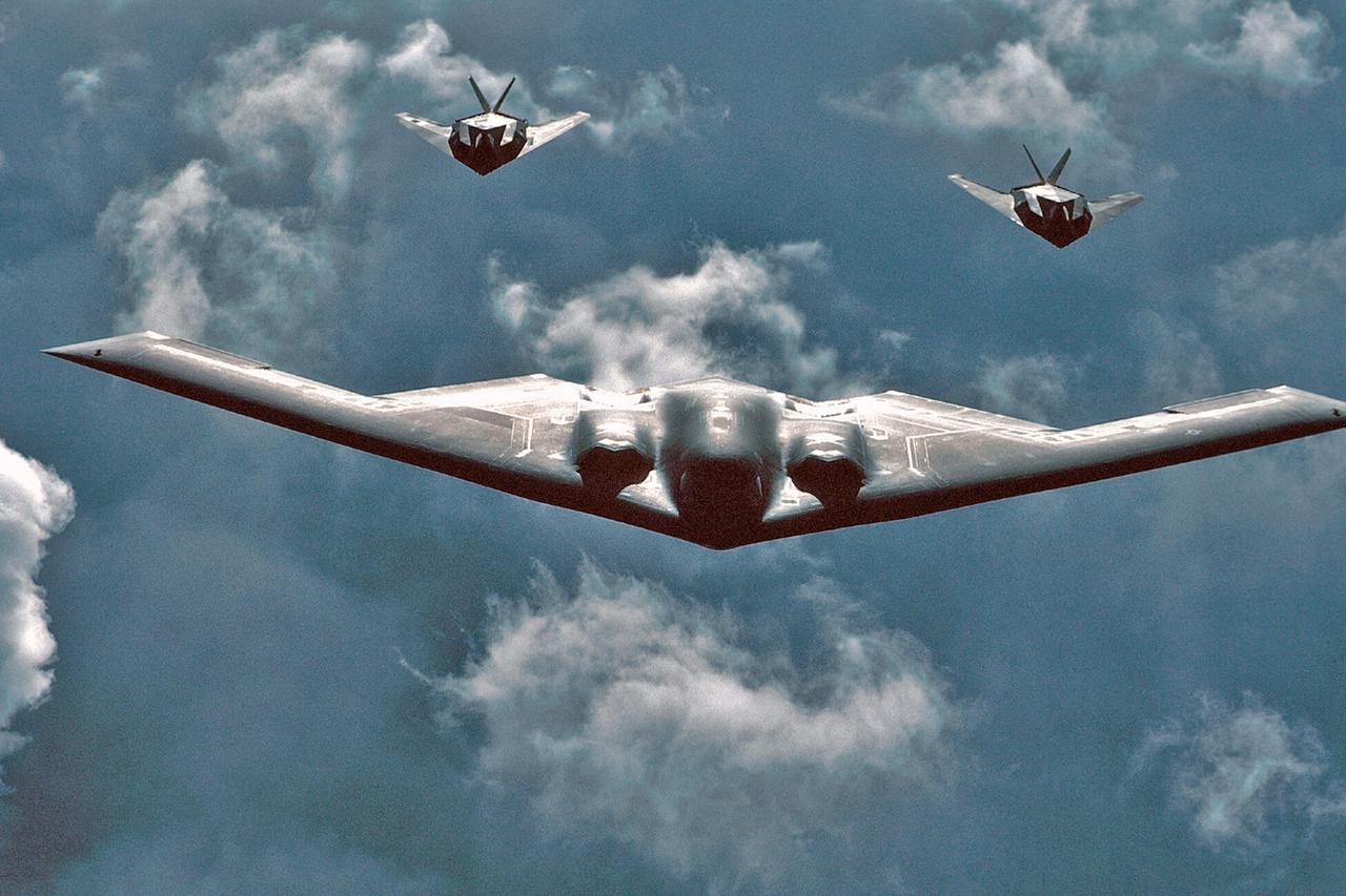Northrop B-2 Spirit Bomber Followed by two Lockheed F-117 Nighthawks
