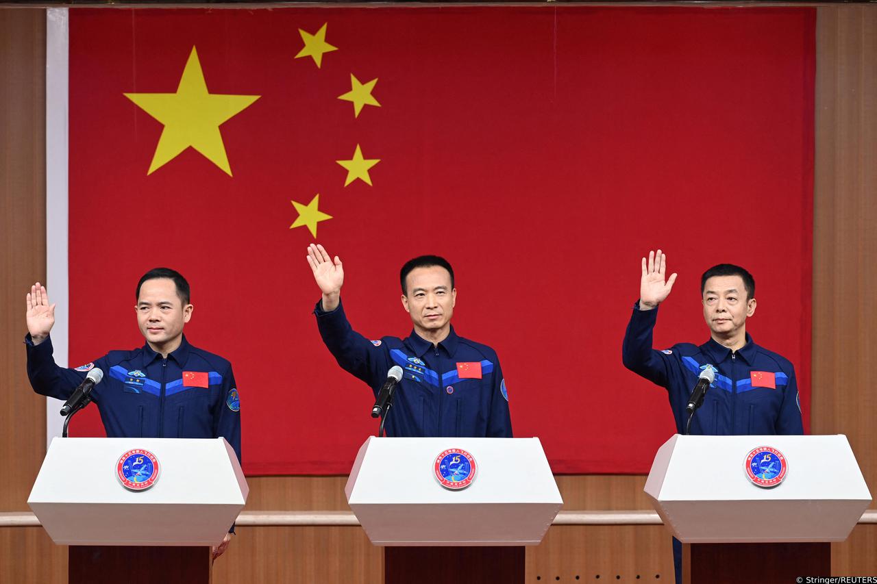 Astronauts Fei Junlong, Deng Qingming and Zhang Lu attend a news conference before the Shenzhou-15 spaceflight mission, at Jiuquan Satellite Launch Center