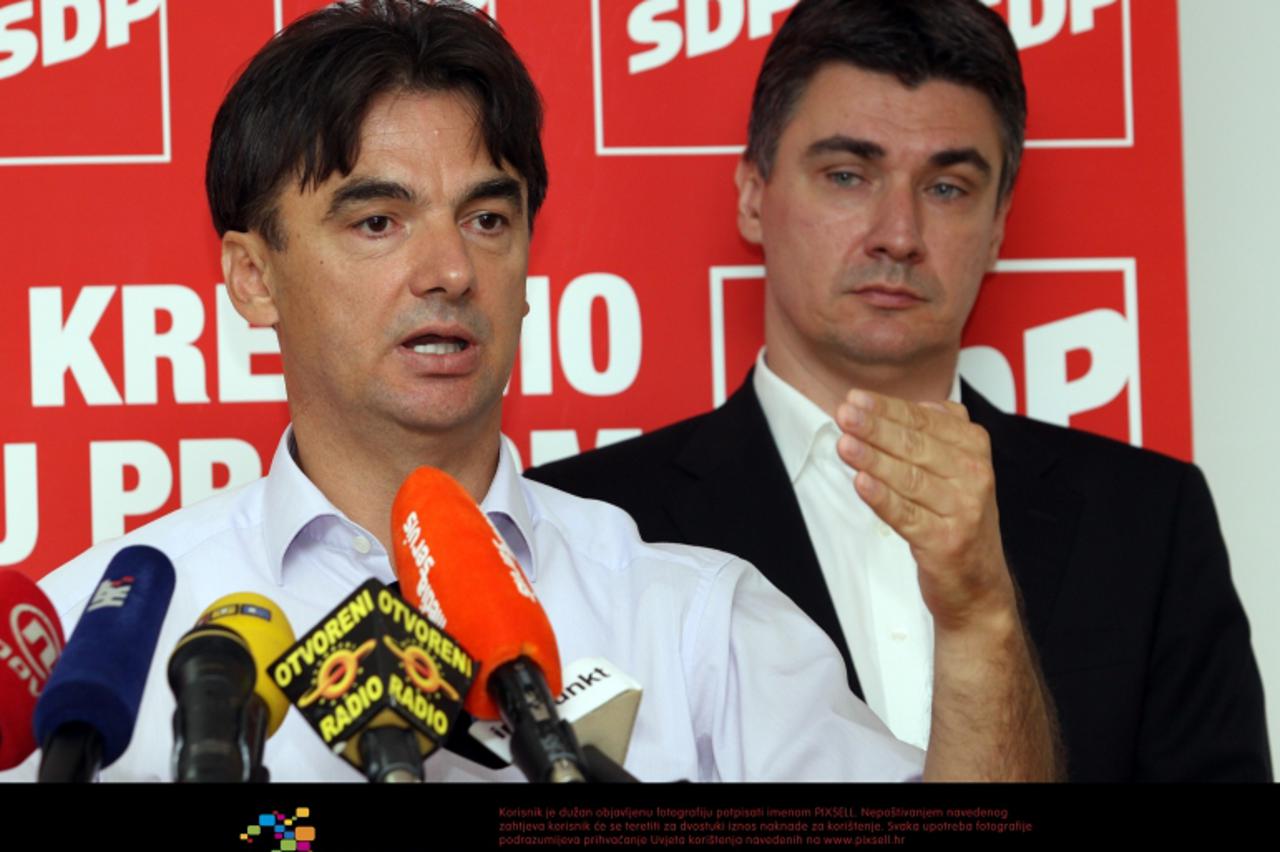 \'14.08.2010., Zagreb - Sjediste SDP-a, konferencija za novinare na temu rebalans Drzavnog proracuna,  Zoran Milanovic, Branko Grcic . Photo: Zarko Basic/PIXSELL\'