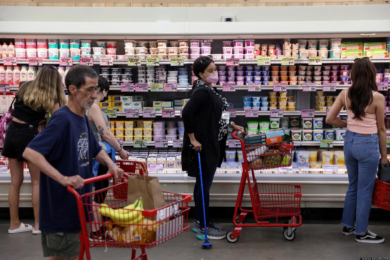 FILE PHOTO: People shop in a supermarket as inflation affected consumer prices in Manhattan, New York City