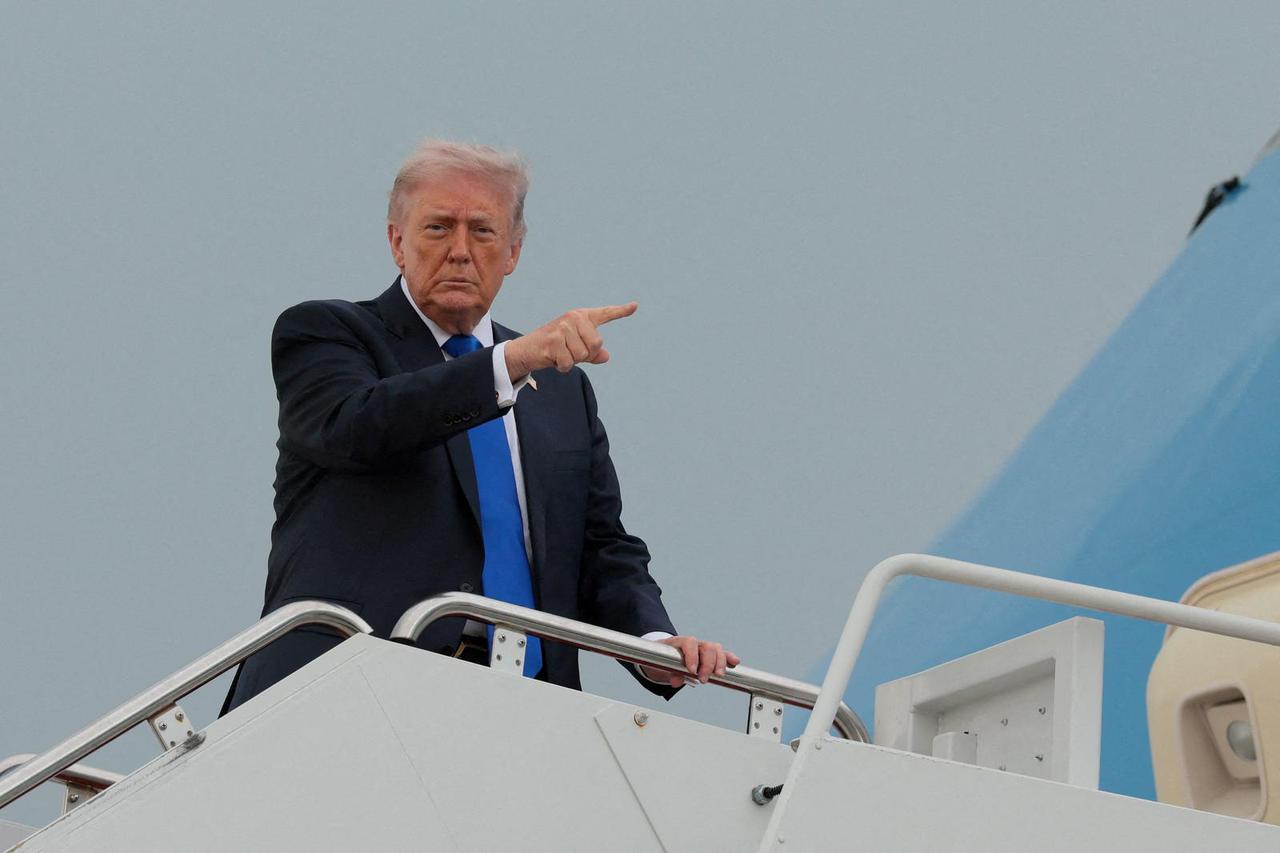 FILE PHOTO: U.S. President Donald Trump boards Air Force One en route to Palm Beach International Airport, at Joint Base Andrews