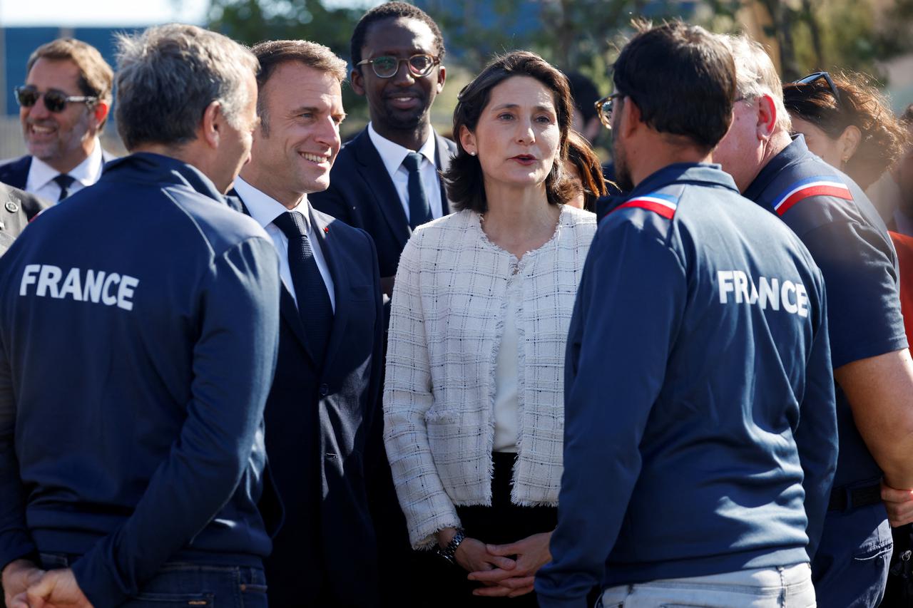 France's President Emmanuel Macron visits the "Marina Olympique" nautical base in Marseille