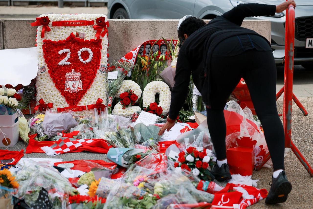 Fans pay their respects to late soccer player Diogo Jota, in Liverpool