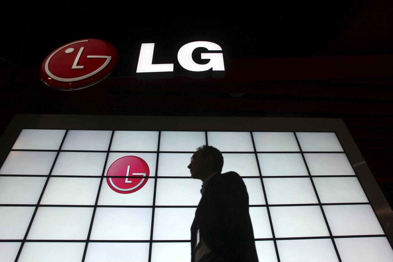 FILE PHOTO: A show attendee passing by the LG Electronics booth during the 2009 International Consumer Electronics Show in Las Vegas