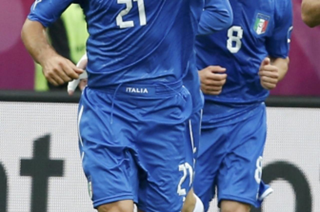 'Italy's Andrea Pirlo celebrates after scoring a goal against Croatia during their Group C Euro 2012 soccer match at the ctiy stadium in Poznan June 14, 2012.     REUTERS/Tony Gentile (POLAND  - Tags
