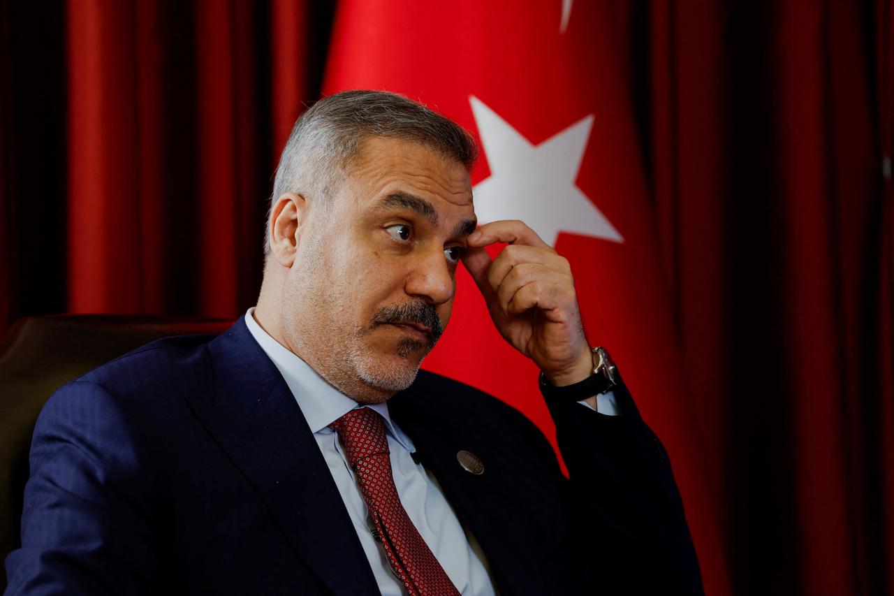 Turkish Foreign Minister Hakan Fidan looks on during an interview with Reuters at the 23rd edition of the annual Doha Forum, in Doha