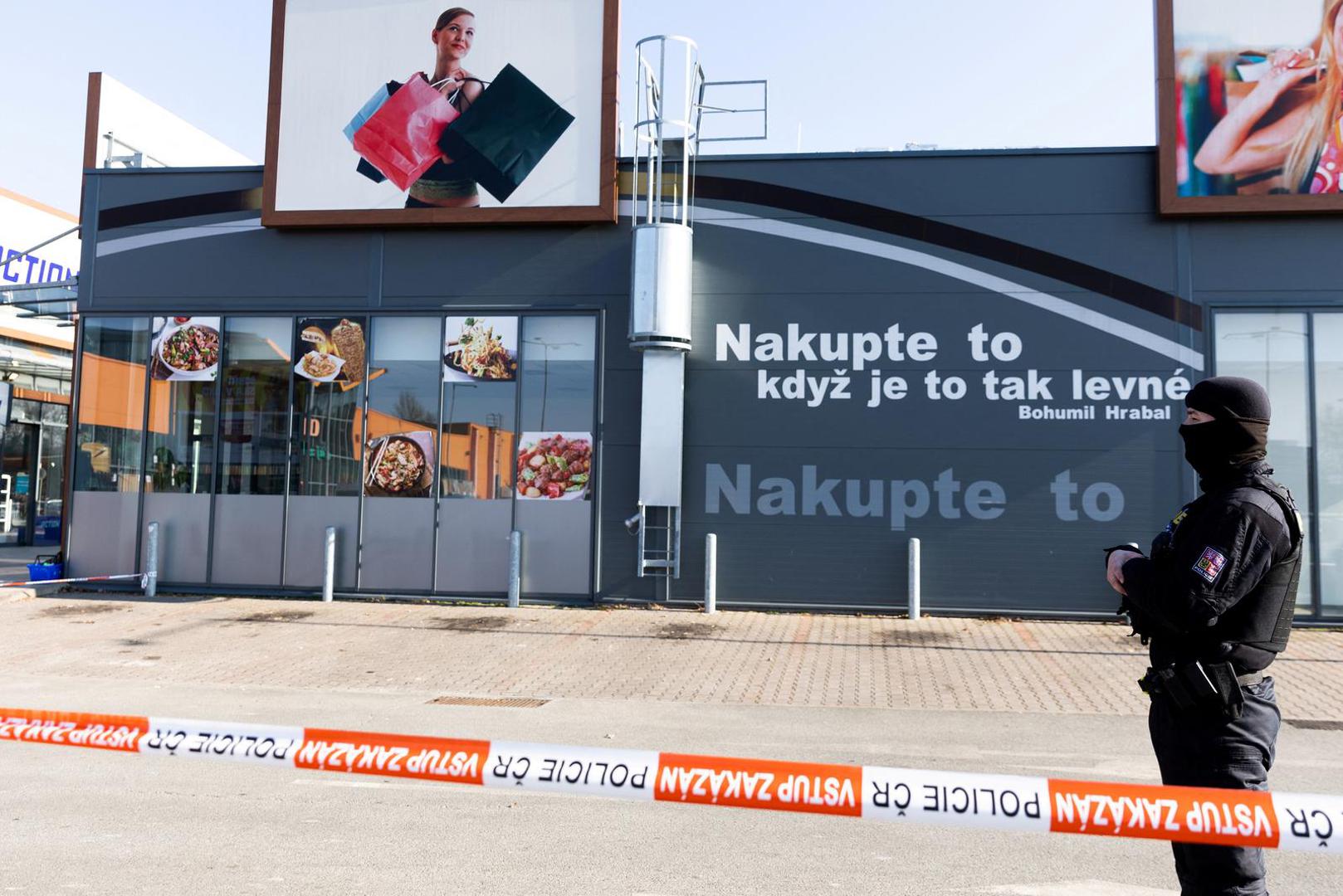 A police officer stands guard in a shopping area at the site where two women have died in a knife attack in Hradec Kralove, Czech Republic, February 20, 2025. REUTERS/Eva Korinkova Photo: EVA KORINKOVA/REUTERS