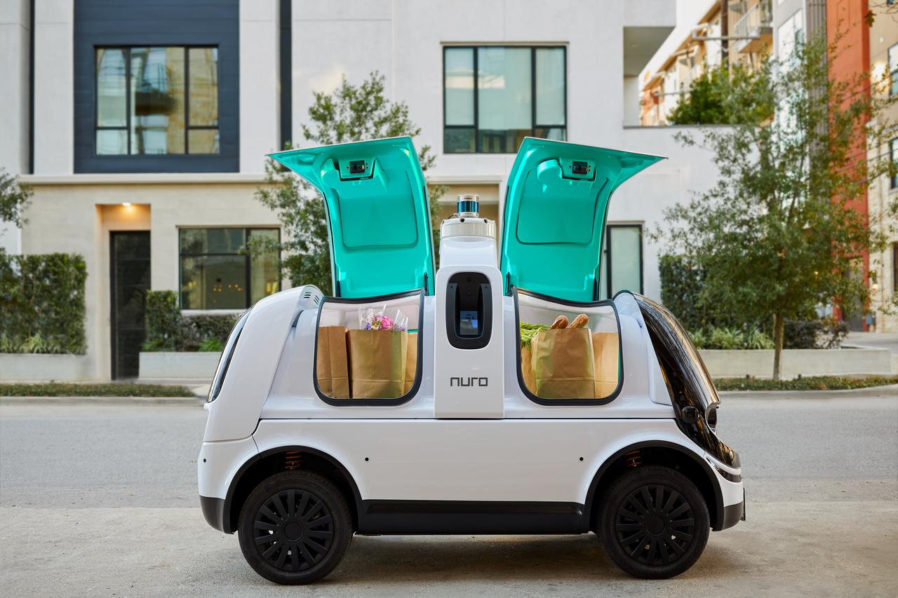 A self-driving delivery firm Nuro's R2 vehicle with groceries inside is seen in Houston, Texas
