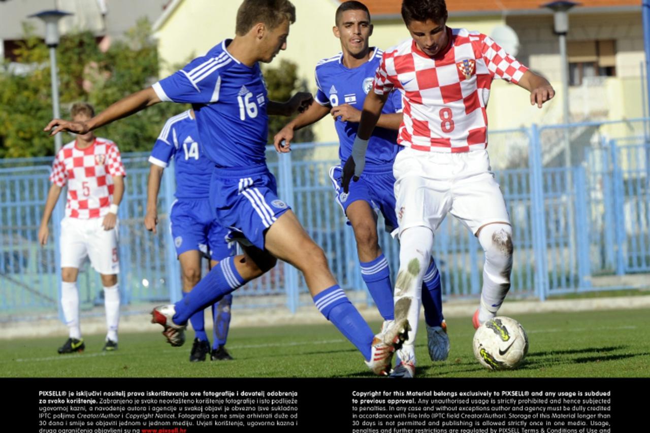 '14.10.2012., Sinj - U-17, kvalifikacije za Euro, Hrvatska - Izrael. Ante Roguljic i Nasikovski Ron.  Photo: Tino Juric/PIXSELL'
