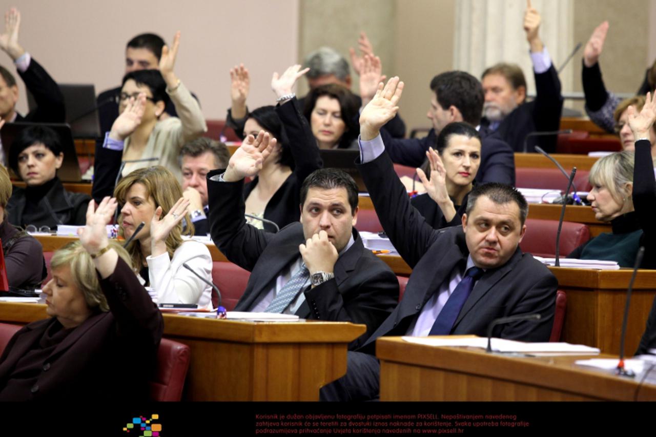 '04.12.2012., Zagreb - Sjednica Sabora RH nastavljena je  glasovanjem o Prijedlogu drzavnog proracuna Republike Hrvatske za 2013. godinu i projekcijama za 2014. i 2015. godinu Photo: Patrik Macek/PIXS