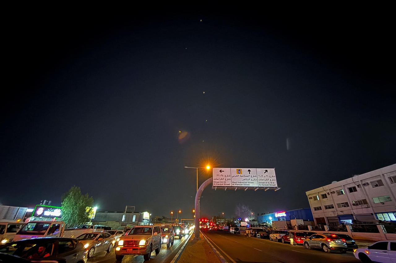 Traces are seen in the sky after Iran's armed forces say they targeted The Al-Udeid base in a missile attack