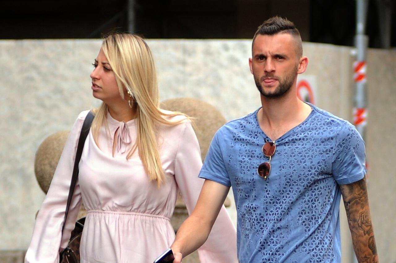Milan, Marcelo BrozoviÄ? and a walk girlfriend in the center of Inter player and the Croatian National Marcelo BrozoviÄ? surprised for a walk with his girlfriend. Here he is walking in Corso Venezia after a visit to the boutique of 