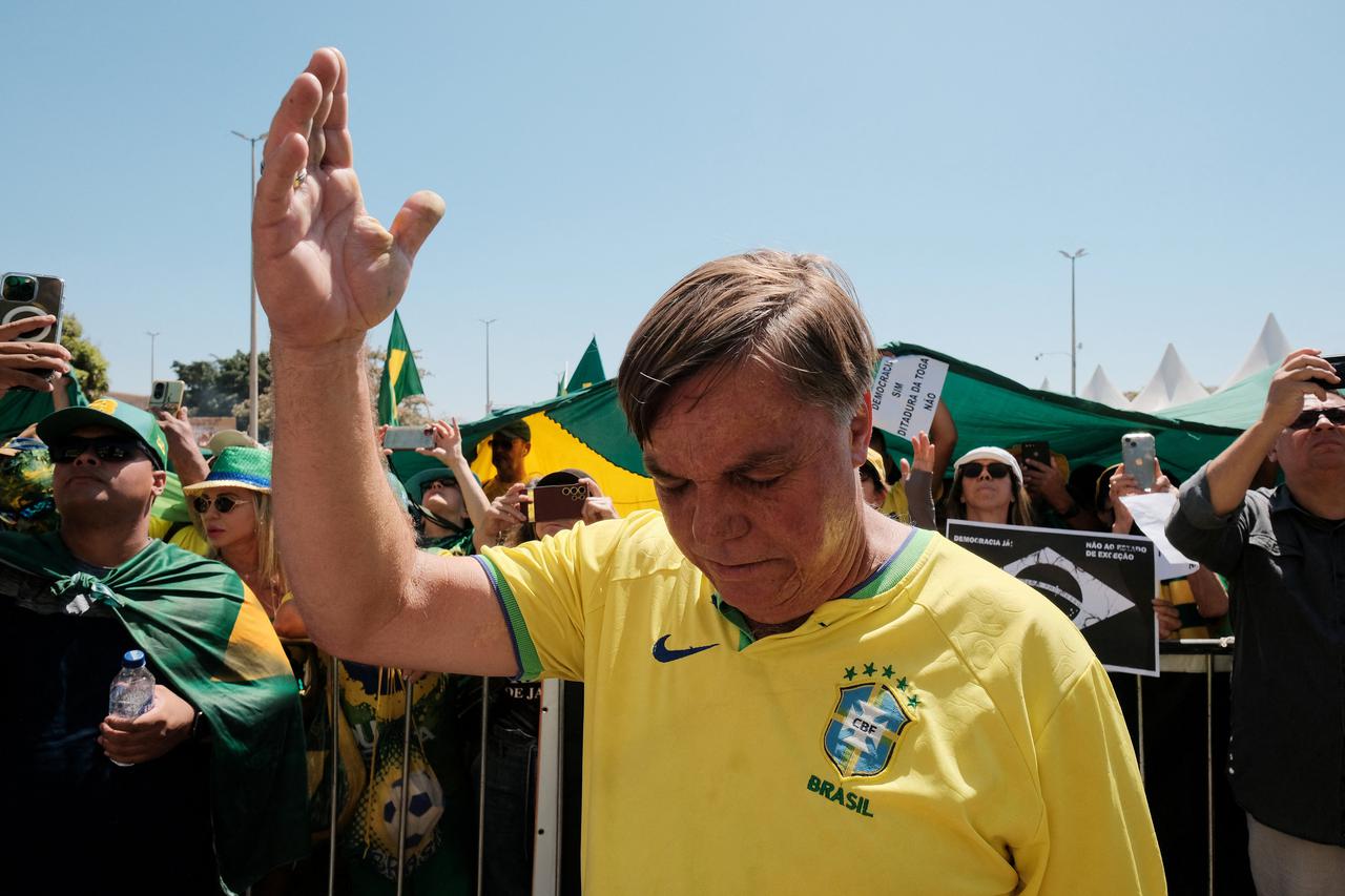 Uber driver Alessandro Almeida, a supporter of Brazil’s former President Jair Bolsonaro, is mistaken for the former president on the streets in Brasilia