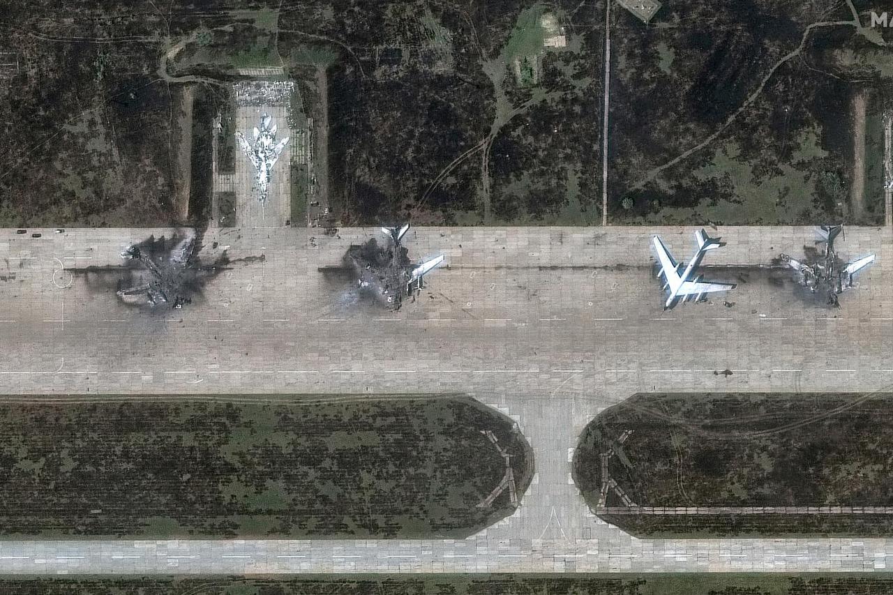 FILE PHOTO: A satellite image shows destroyed TU 95 aircrafts in the aftermath of a drone strike at the Belaya air base