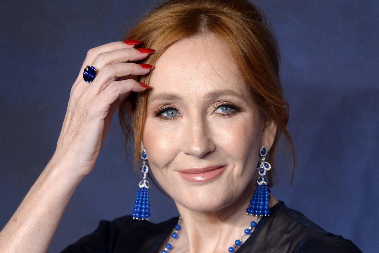 FILE PHOTO: Writer J.K. Rowling poses as she arrives for the European premiere of the film "Fantastic Beasts and Where to Find Them" at Cineworld Imax, Leicester Square in London