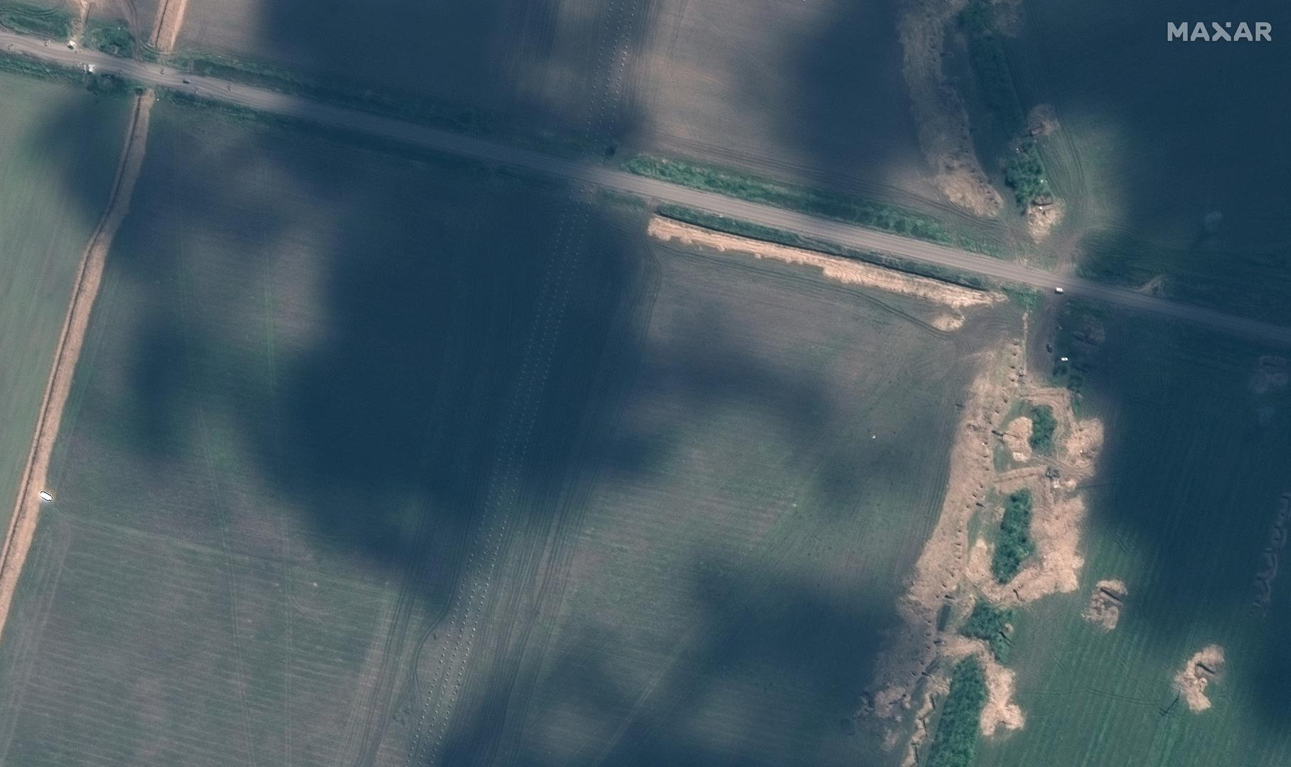 A satellite image shows an overview of fortifications built by the Russian army, including "dragon's teeth" and trenches, stretching across the town of Tokmak, amid Russia?s attack on Ukraine, in Zaporizhzhia region, Ukraine, May 12, 2023. Maxar Technologies/Handout via REUTERS THIS IMAGE HAS BEEN SUPPLIED BY A THIRD PARTY. NO RESALES. NO ARCHIVES. MANDATORY CREDIT. DO NOT OBSCURE LOGO Photo: MAXAR TECHNOLOGIES/REUTERS