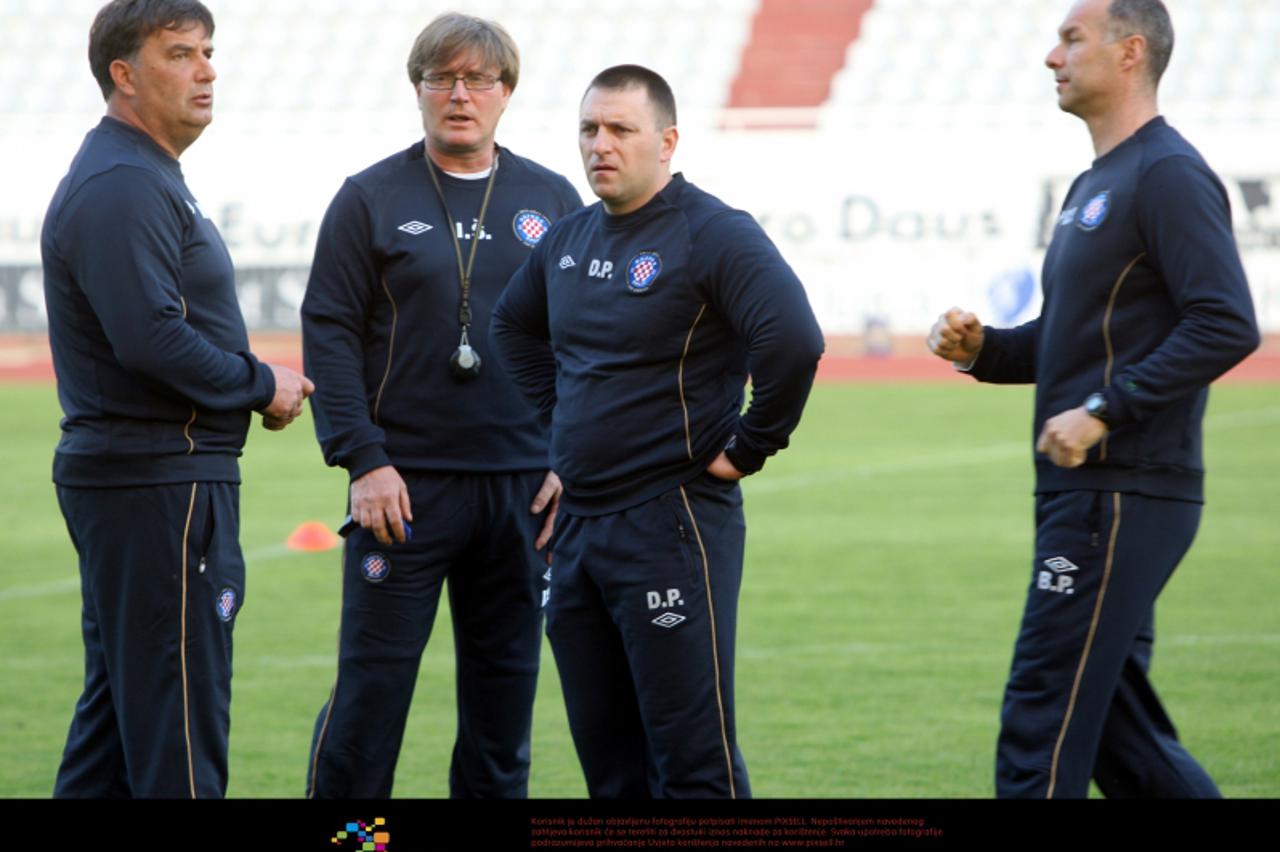 '23.03.2012., Split - Novi hajdukov trener Miso Krsticevic odradio prvi sluzbeni trening nakon jutrosnjeg predstavljanja u klubu. Trener s pomocnicima Ivom Separovicem, Dujom Poljakom i Borisom Peyrek