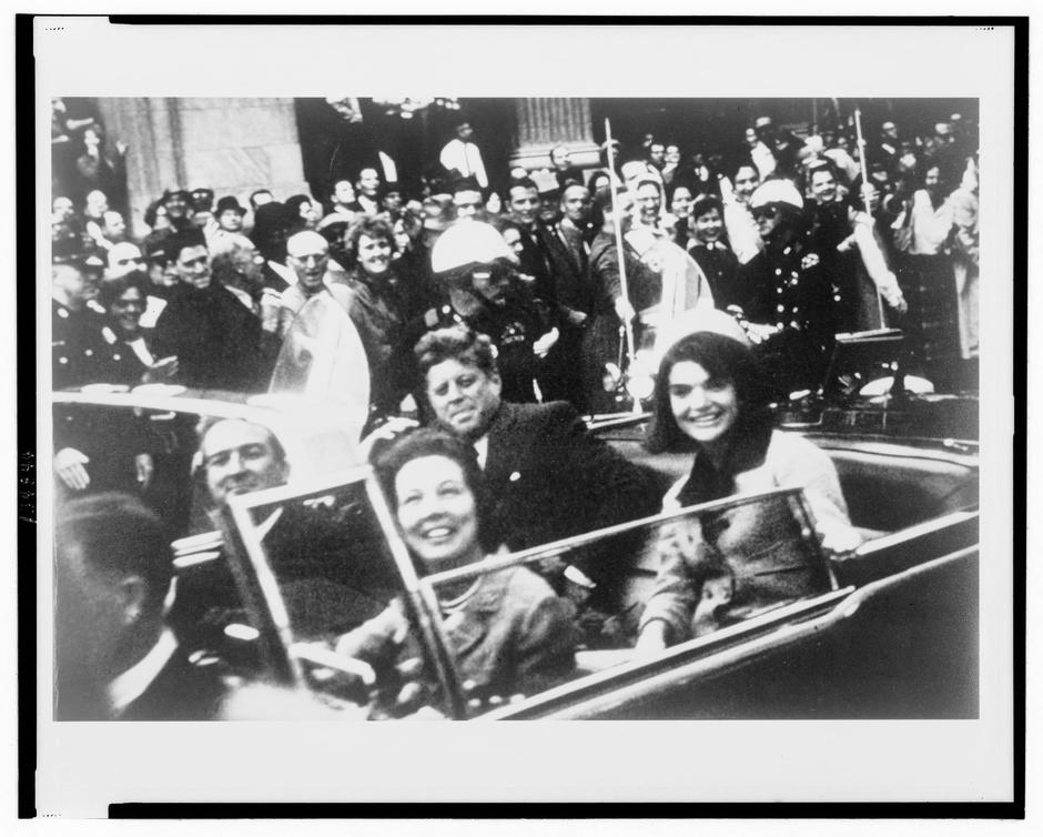 FILE PHOTO: File handout image shows former U.S. President Kennedy and first lady Jacqueline Kennedy riding in motorcade in Dallas