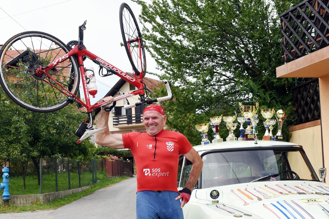 14.09.2015., Zagreb - Stanko Skec, duatlonac sa svojim medaljama i trofejima. Photo: Davor Visnjic/PIXSELL