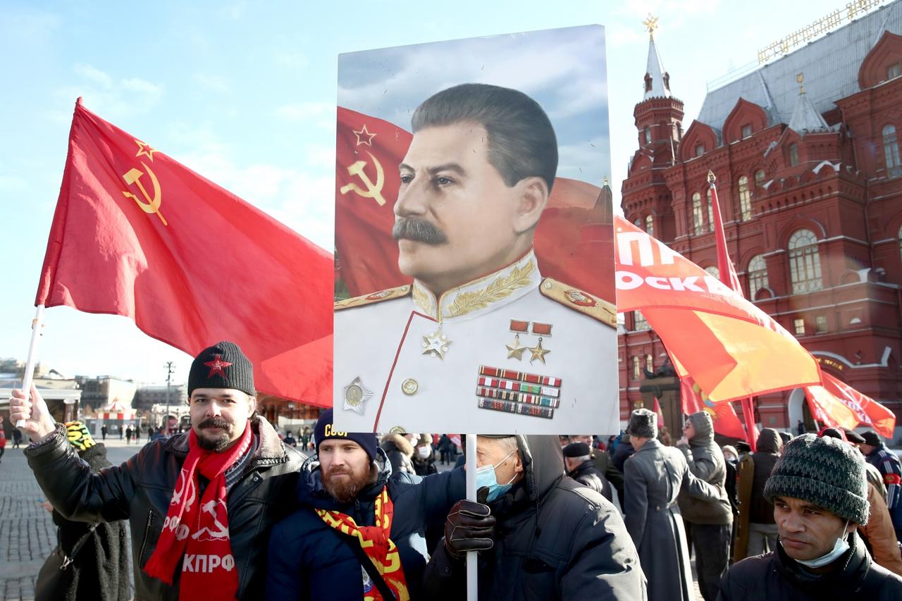 Flower laying ceremony at Joseph Stalin's grave by Moscow Kremlin wall in Moscow