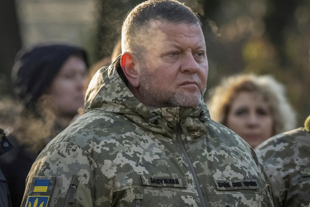 FILE PHOTO: Chief of the Ukrainian Armed Forces Zaluzhnyi visits a monument to Holodomor victims in Kyiv