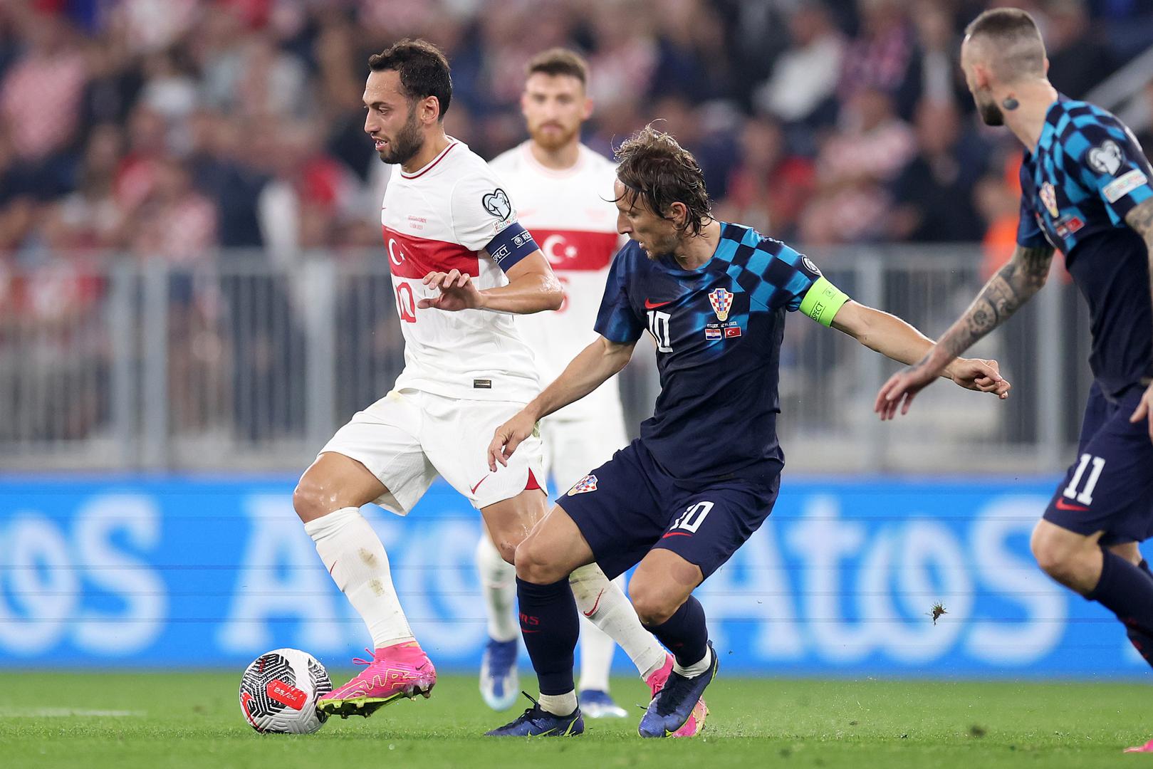 12.10.2023., Opus Arena, Osijek - Kvalifikacije za UEFA Europsko prvenstvo 2024., skupina D, 7. kolo, Hrvatska - Turska. Hakan Calhanoglu, Luka Modric Photo: Igor Kralj/PIXSELL