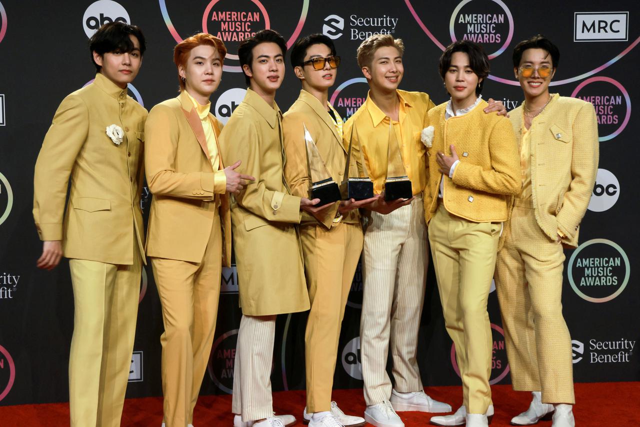FILE PHOTO: BTS attend the 2021 American Music Awards at the Microsoft Theater in Los Angeles