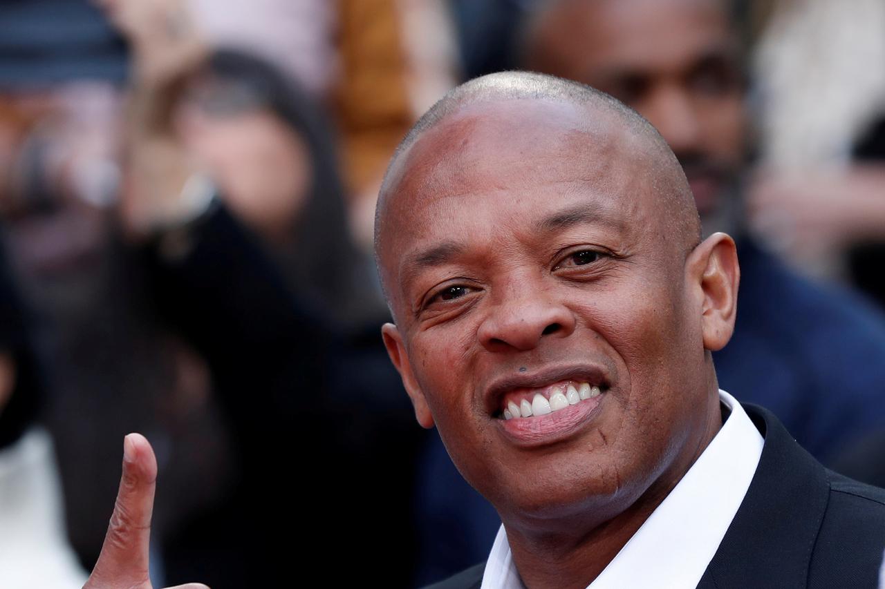 FILE PHOTO: Dr. Dre attends a ceremony for composer Quincy Jones to place his hand and footprints in cement in the forecourt of the TCL Chinese theatre in Los Angeles