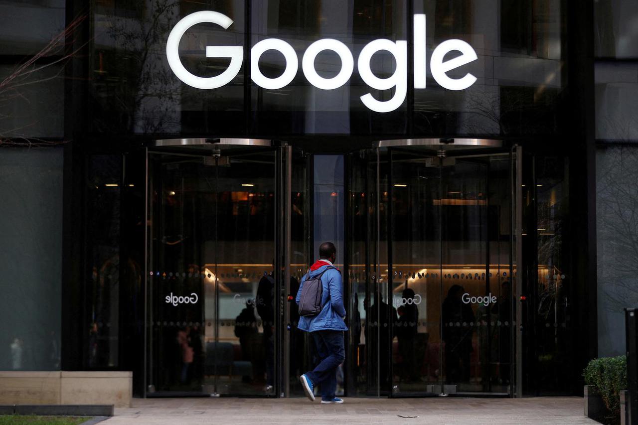 FILE PHOTO: The Google logo is pictured at the entrance to the Google offices in London