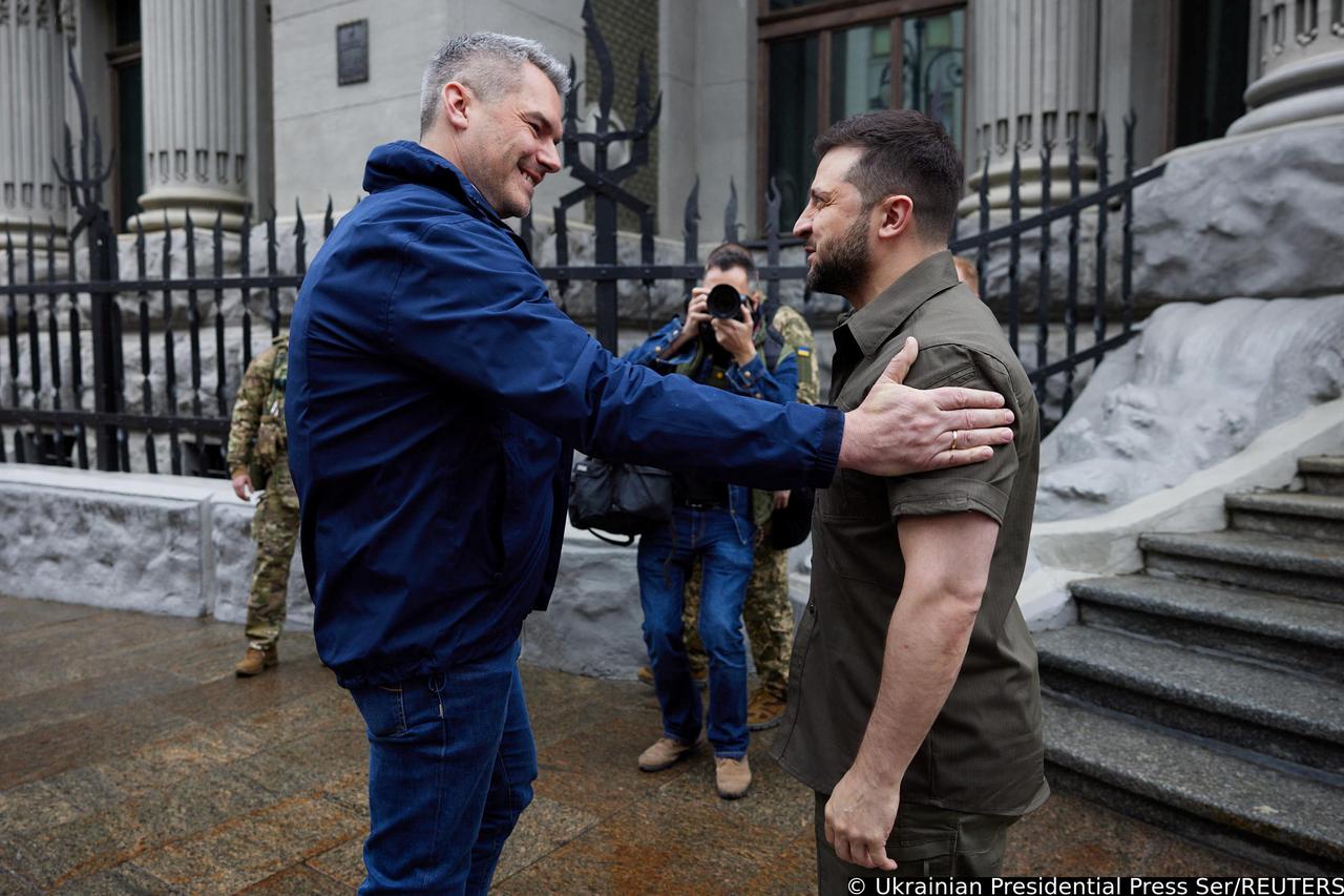 Ukrainian President Zelenskiy welcomes Austrian Chancellor Nehammer before a meeting in Kyiv