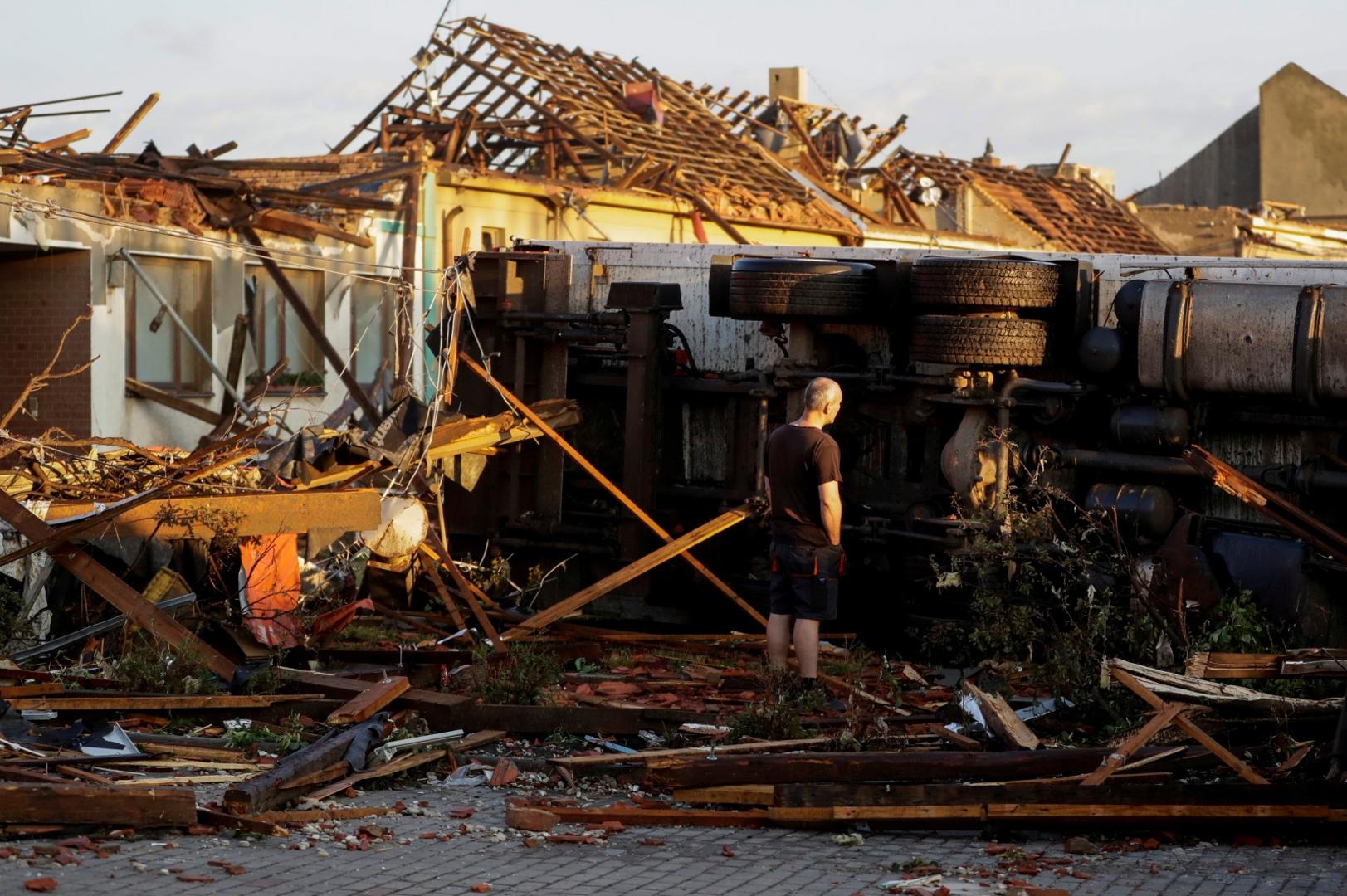 Aftermath of rare tornado in Moravska Nova Ves A man surveys the damages in the aftermath of a rare tornado that struck and destroyed parts of some towns, in the village of Moravska Nova Ves, Czech Republic, June 25, 2021. REUTERS/David W Cerny DAVID W CERNY