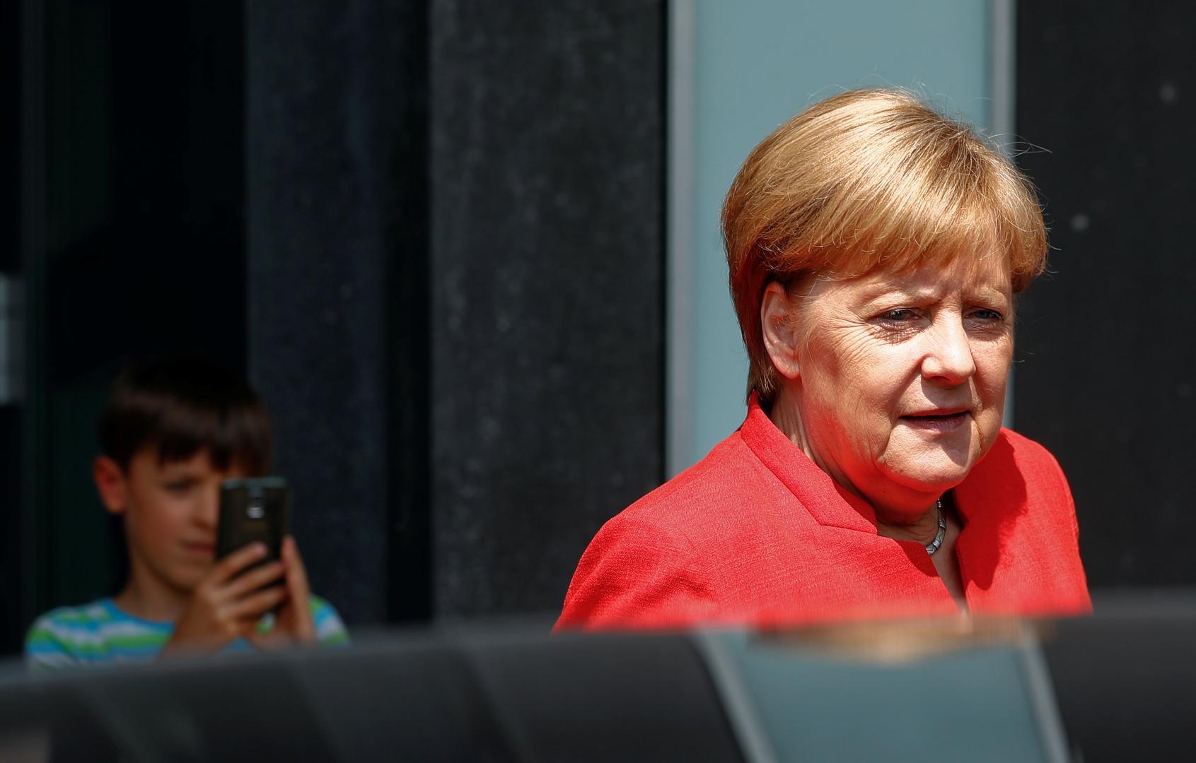 Merkel zadovoljna- Njemačkoj je vladi bilo važno da Trump obeća da neće uvoditi carine na europske aute