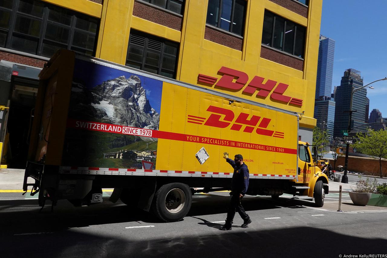 A truck parks at a DHL delivery facility in Manhattan, New York City