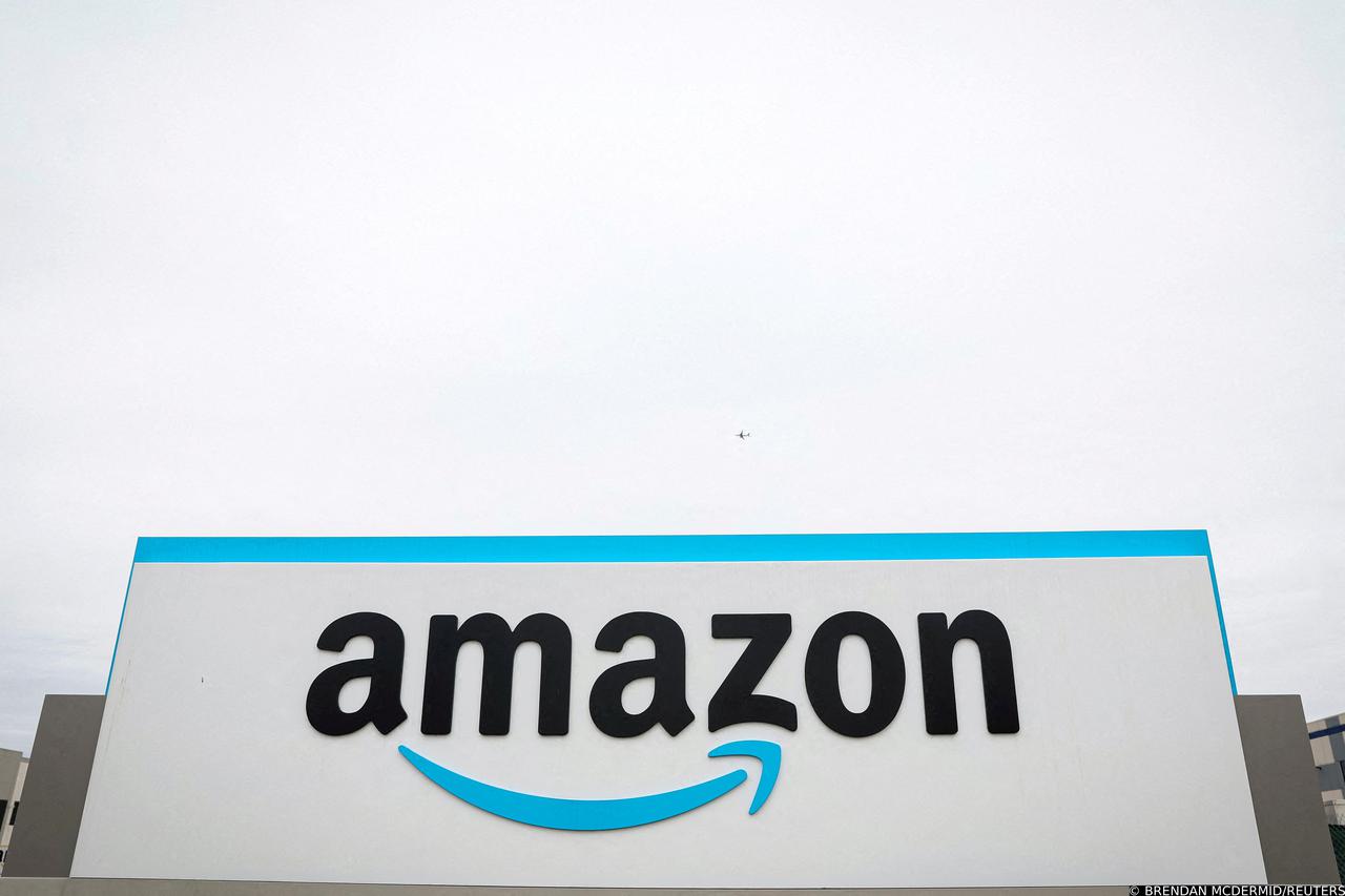 FILE PHOTO: FILE PHOTO: Amazon logo is displayed outside LDJ5 sortation center in New York City
