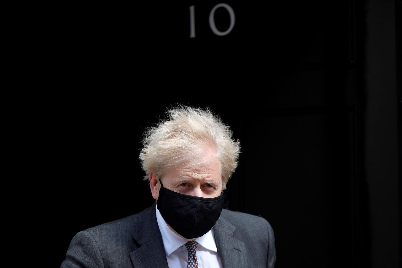 FILE PHOTO: Britain's Prime Minister Boris Johnson leaves Downing Street in London