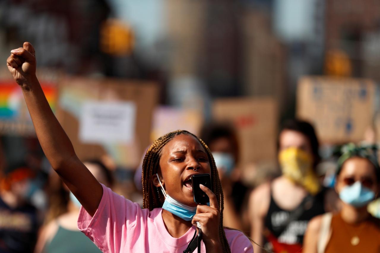 Demonstrators march in support of gay pride and black lives matter movements in New York City, New York